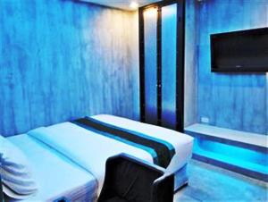 Televisyen dan/atau pusat hiburan di Blutique Hotel
