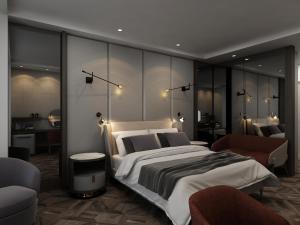 Postel nebo postele na pokoji v ubytování BN Hotel Thermal & Wellness