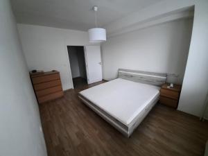 Postel nebo postele na pokoji v ubytování Apartman Vbloku