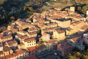 an aerial view of a town with buildings at Antiche Fonti in Bibbona