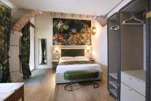 Postel nebo postele na pokoji v ubytování Suites&Atelier Lake Como