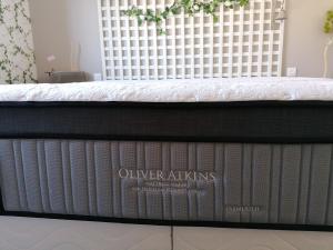 a mattress with the words oliver mattress on it at logement en campagne in Landemer