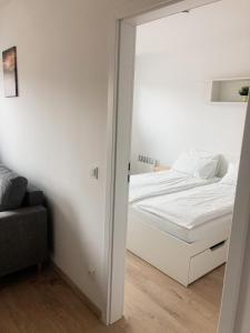 Posteľ alebo postele v izbe v ubytovaní Starter III