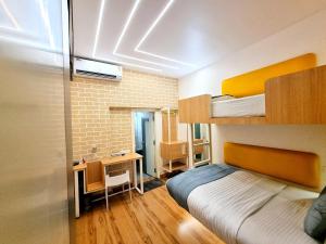 Postel nebo postele na pokoji v ubytování Stay Inn + 37 fotografií