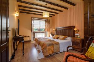 Un pat sau paturi într-o cameră la Casal dos Celenis