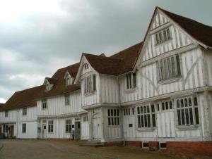 a large white building with a brown roof at The Swan Inn in Monks Eleigh