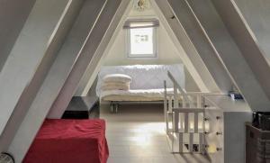 Rúm í herbergi á Chalet Dunepark, Oostduinkerke