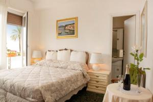 Ένα ή περισσότερα κρεβάτια σε δωμάτιο στο Il Ponentino