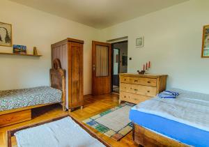 Postel nebo postele na pokoji v ubytování Holiday House Rokytnice