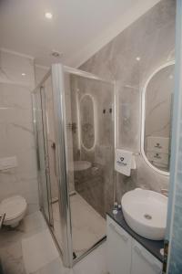 Ванна кімната в Hotel Vertigos