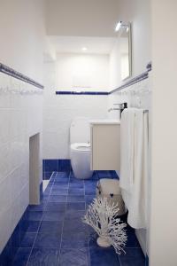 Koupelna v ubytování BLU MARE suite privata & apartment