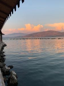 a view of a bridge over a body of water at The Mussel House in Ksamil
