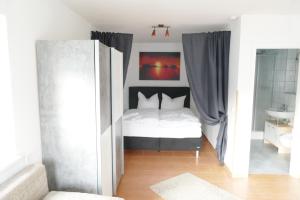 Postel nebo postele na pokoji v ubytování Haus Bella