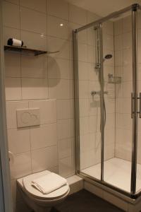 Koupelna v ubytování HOLT Hotel