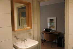 Koupelna v ubytování HOLT Hotel