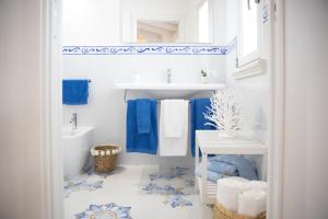 Koupelna v ubytování BLU MARE suite privata & apartment