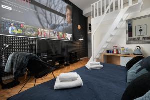 Posteľ alebo postele v izbe v ubytovaní apartamenty kamienica + 37 fotografií