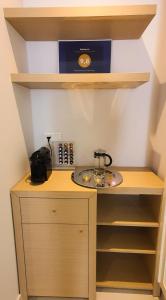 A kitchen or kitchenette at Mediterraneo Suite Home