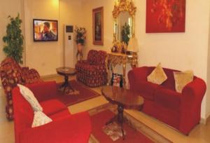 Кът за сядане в Room in Lodge - Ambassadors Hotel Ikoyi