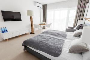 Posteľ alebo postele v izbe v ubytovaní Your Holidays Aquamarina PRIMA