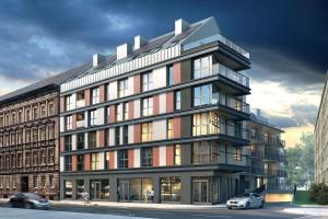 Silesia Aparthotel في شتتين: مبنى كبير فيه سيارات تقف امامه