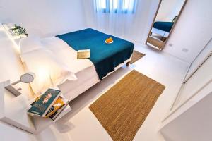 Posteľ alebo postele v izbe v ubytovaní Apartamentos Cotillo Surf