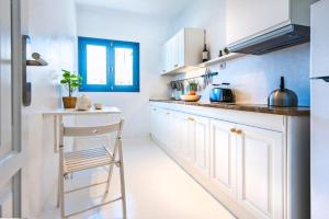 Kuchyňa alebo kuchynka v ubytovaní Apartamentos Cotillo Surf