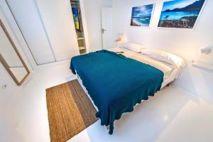 Posteľ alebo postele v izbe v ubytovaní Apartamentos Cotillo Surf