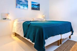 Posteľ alebo postele v izbe v ubytovaní Apartamentos Cotillo Surf