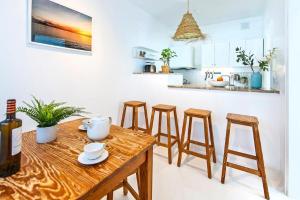 Kuchyňa alebo kuchynka v ubytovaní Apartamentos Cotillo Surf
