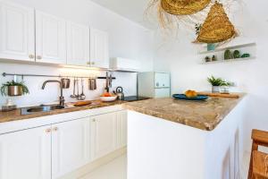 Kuchyňa alebo kuchynka v ubytovaní Apartamentos Cotillo Surf