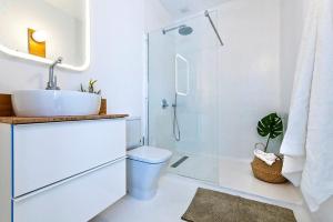 Kúpeľňa v ubytovaní Apartamentos Cotillo Surf + 37 fotografií