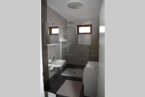 Koupelna v ubytování Apartman WALKOW + 3 fotografie