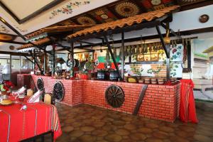 A restaurant or other place to eat at Duni Holiday Village - All Inclusive