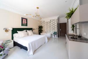 Posteľ alebo postele v izbe v ubytovaní Real Segovia Apartments by Recordis Hotels