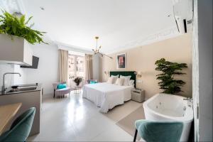 Posteľ alebo postele v izbe v ubytovaní Real Segovia Apartments by Recordis Hotels