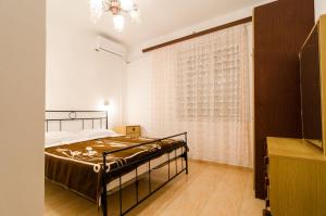 Postel nebo postele na pokoji v ubytování Guest House Kiko + 37 fotografií