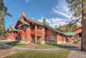 a large wooden house with a green roof at WorldMark Big Bear Lake in Big Bear Lake