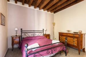 En eller flere senge i et værelse på Pinzochere PT + 6 billeder