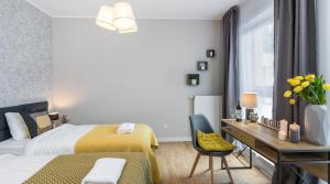 Posteľ alebo postele v izbe v ubytovaní Finale Apartments