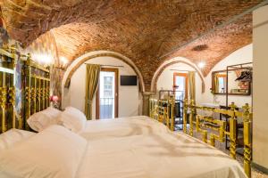 Postel nebo postele na pokoji v ubytování Ca' Monteggia Guest House