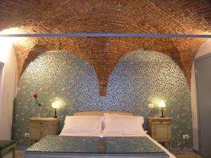 Postel nebo postele na pokoji v ubytování Ca' Monteggia Guest House