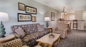 a living room with a couch and a table at WorldMark Branson in Branson