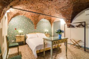 Postel nebo postele na pokoji v ubytování Ca' Monteggia Guest House