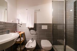 Koupelna v ubytování Ca' Monteggia Guest House + 37 fotografií