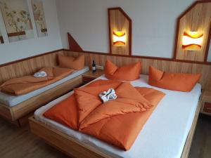 Postel nebo postele na pokoji v ubytování Ferienhaus Alpenroyal