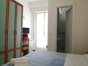 Postel nebo postele na pokoji v ubytování Hotel Derby + 33 fotografií