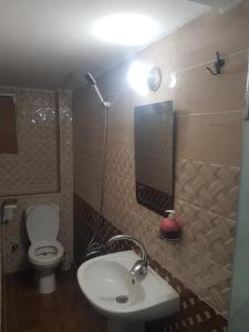 חדר רחצה ב-Downtown Inn