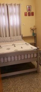Tempat tidur dalam kamar di VILLA SANDRIN-Near White Town and Beach