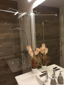 Kúpeľňa v ubytovaní Apartament S&S Nadmorskie Tarasy Kołobrzeg D302